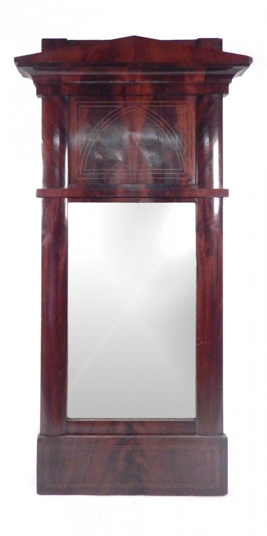 Empire Pier Mirror: Antique mahogany mirror with an arch-form crest and pencil style trim. [58 1/2" W x 28" x 3 3/4" D]. Minor loss.