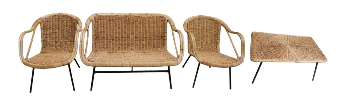 After A. Umanoff, Mid-Century Rattan Set: After Arthur Umanoff. Armchairs, settee, and coffee table with black welded metal legs. [Coffee table: 30" W x 18" D x 14" H; Settee: 43 1/2" W x 25 1/2" D x 29" H; Armchairs: 23" W x 27" D x 28 1/2" 
