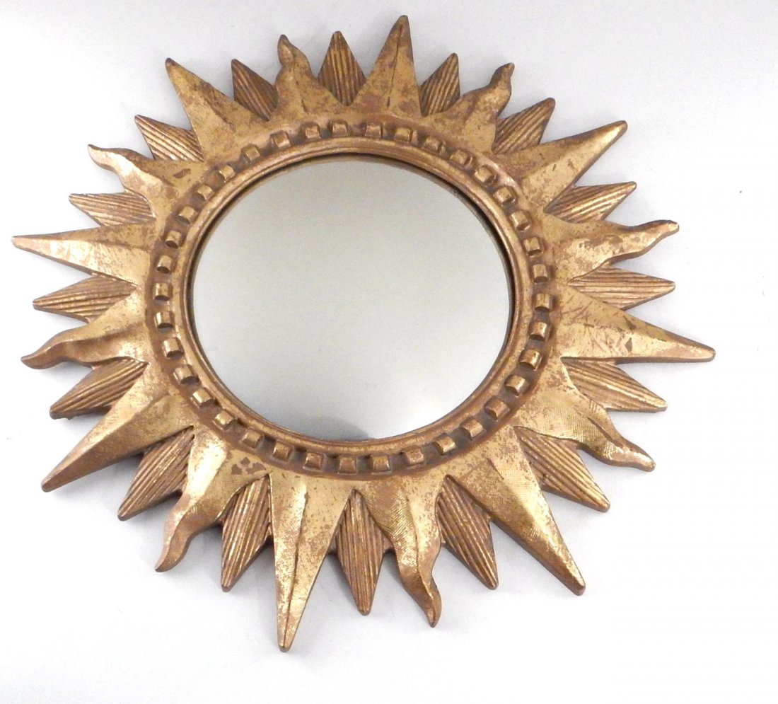 Sunburst Mirror: Gilt sunburst frame around circular mirror. [17 1/4" Dia]. Wear to frame.
