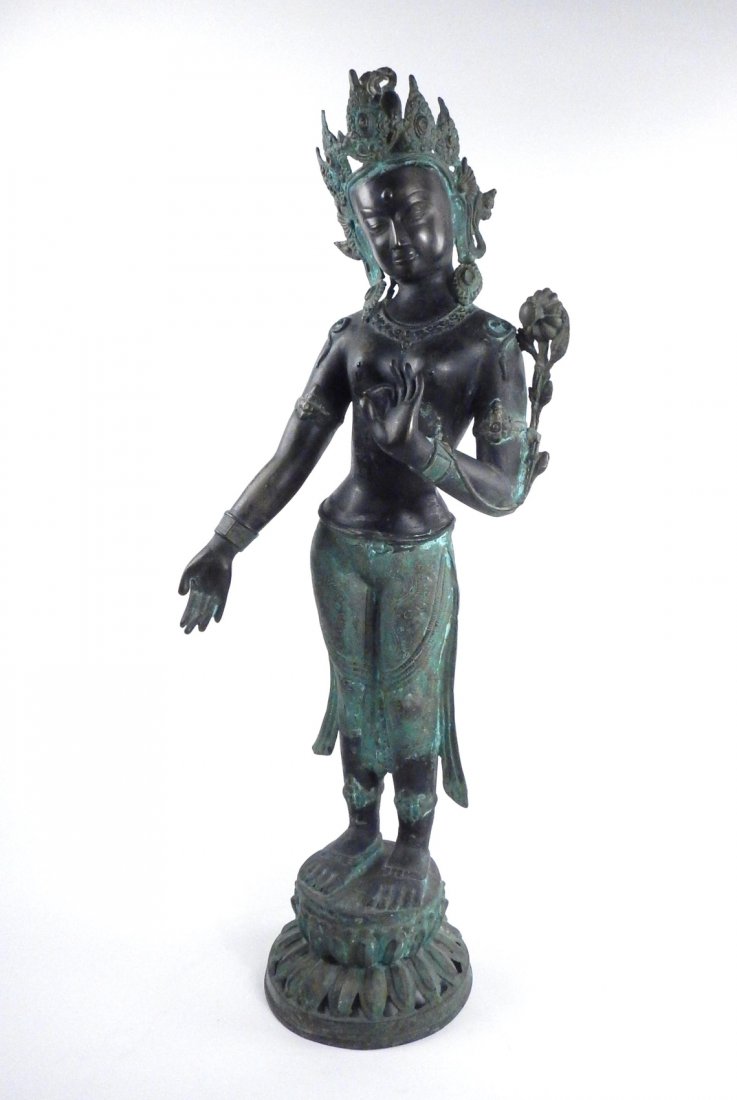 Vintage Nepalese Bronze Sculpture: Bronze "Green Tara" sculpture depicting the Buddhist deity in the traditional "Wish Granting" position. [13" W x 7 1/2" D x 31 3/4" H]. Uneven mottled patina.