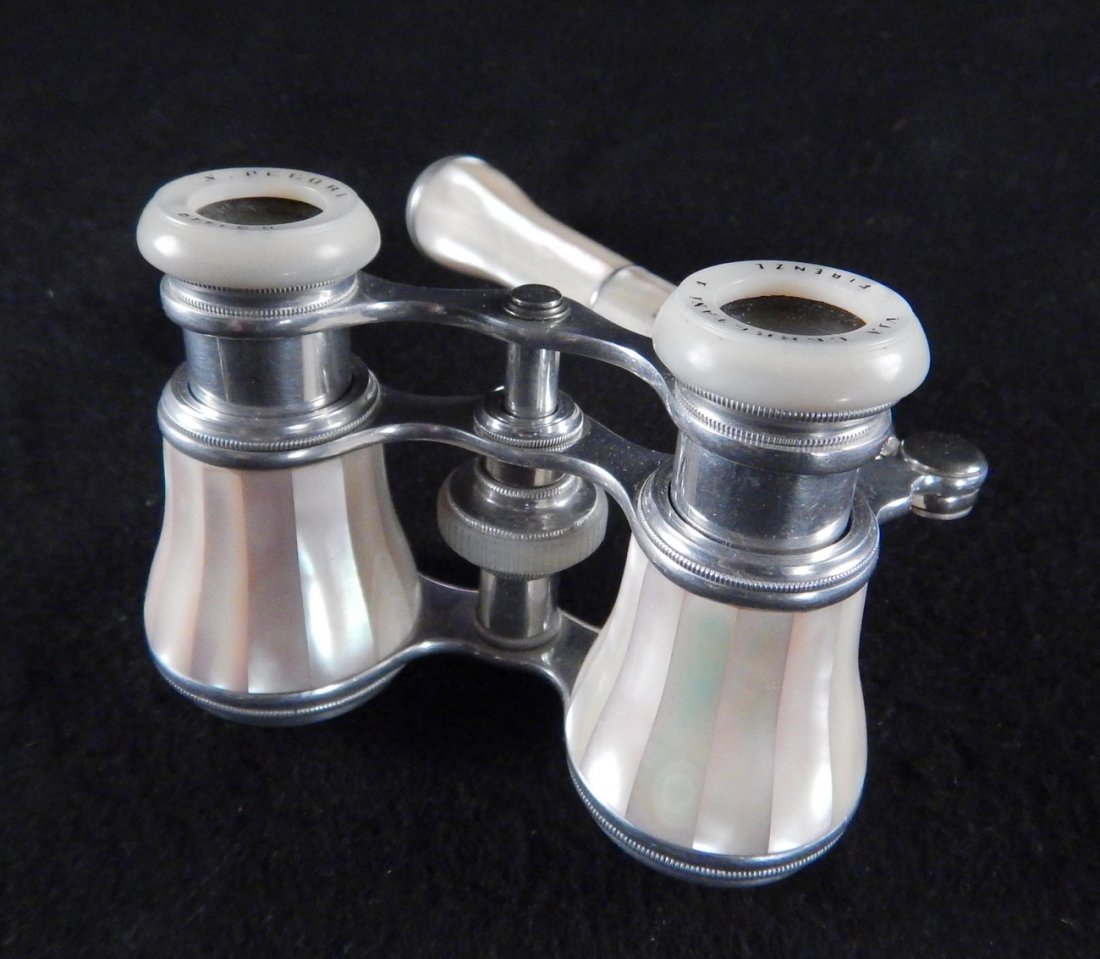 Mother-of-Pearl Opera Glasses: Mother-of-pearl opera glasses with handle. Marked "N. Pecori, Ottico via Cerretani, Firenze".
