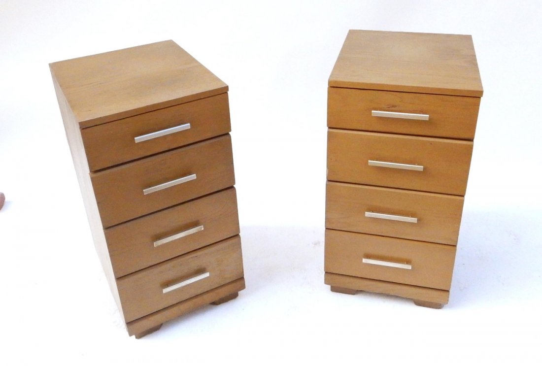 Pair of Mengel Cabinets: Four-drawer oak cabinets with satin nickel pulls. [10 1/8" W x 19" x 31 3/4"]. Wear throughout, both complete.