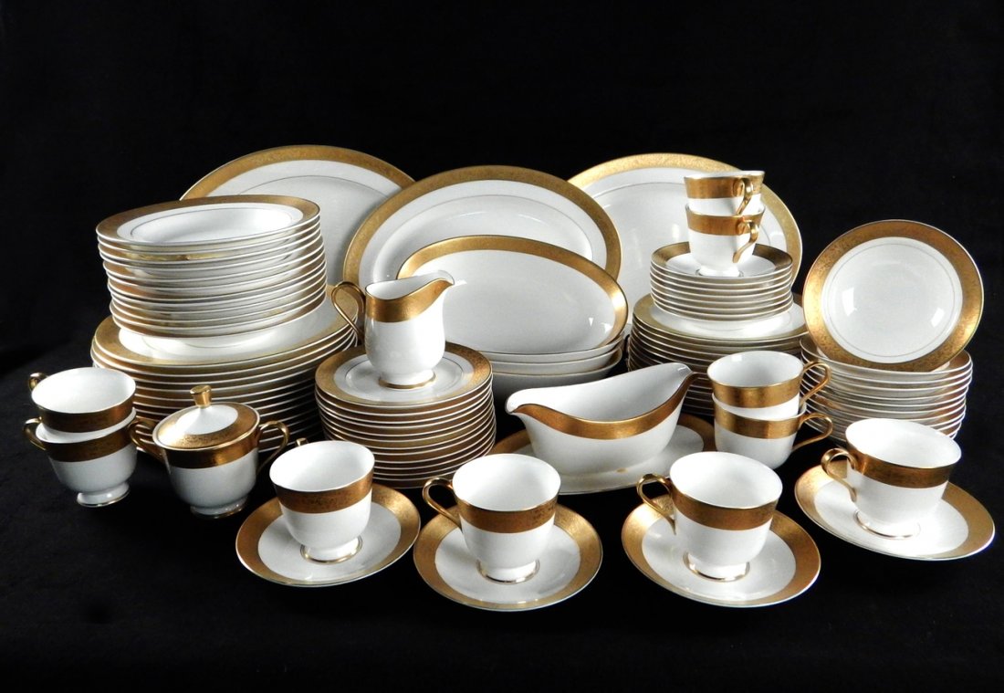 Partial Gold and White Dinner Service: Approx 70 pieces of dinnerware "Sango China" Japan.