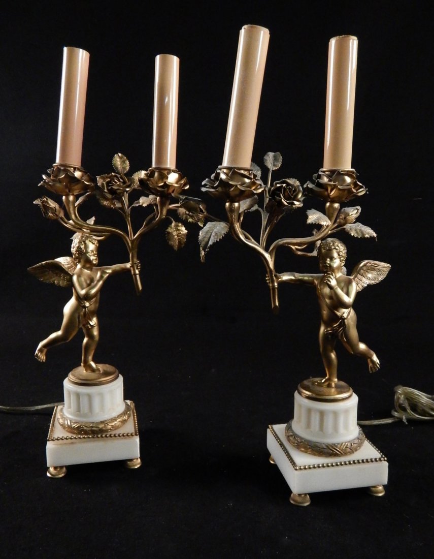 Pair of Cherub Lamps: Pair of gilt metal and alabaster lamps. [Bases: 3 1/4" x 3 1/4"; 11 1/2" H to socket].