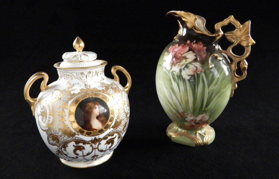 2 German and Austrian Porcelain Vessels: Lidded and handled German jar having a profile portrait with double-headed eagle mark, accompanied by an Austrian Karlsbad ewer with flower motif design. [Ewer: 7" W x 5 1/4" D x 10" H]. Light wear.