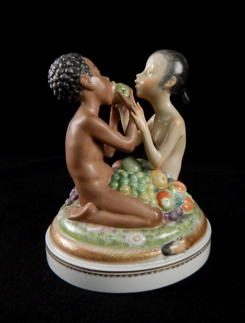 Royal Copenhagen "Adam & Eve": Royal Copenhagen porcelain figural group featuring Adam and Eve eating fruit. [6" H x 4 3/4" H x 4 1/4" D]. In good condition.