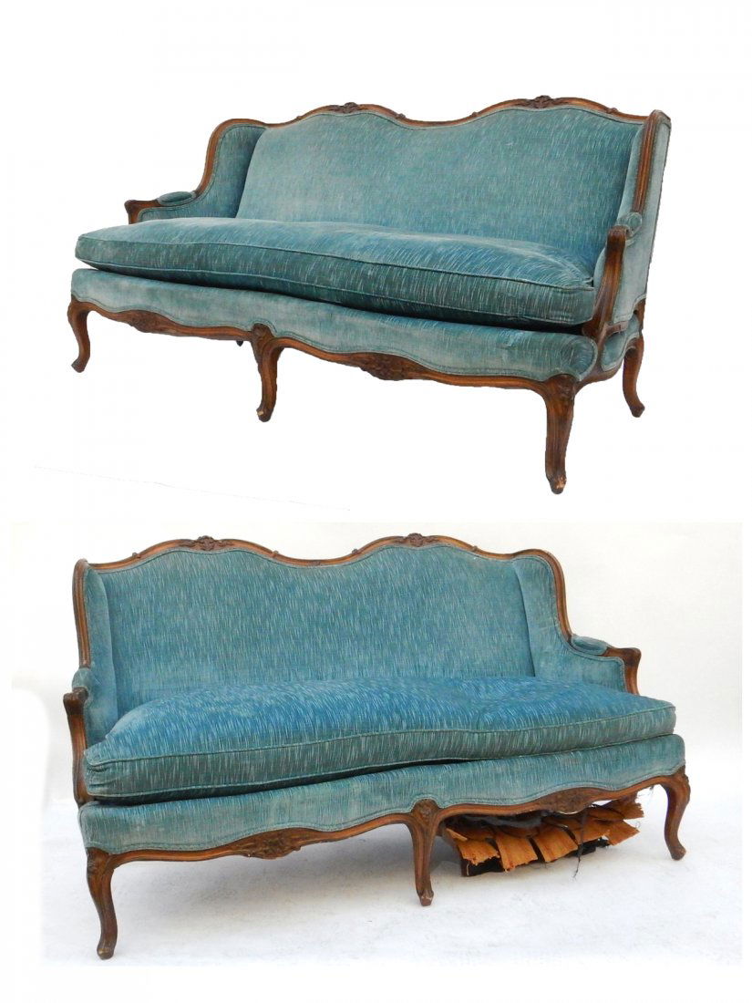Pair of Provincial Settees: Pair of provincial Louis XV-style settees with blue upholstery. [63" W x 33" D x 38" H]. Light wear.