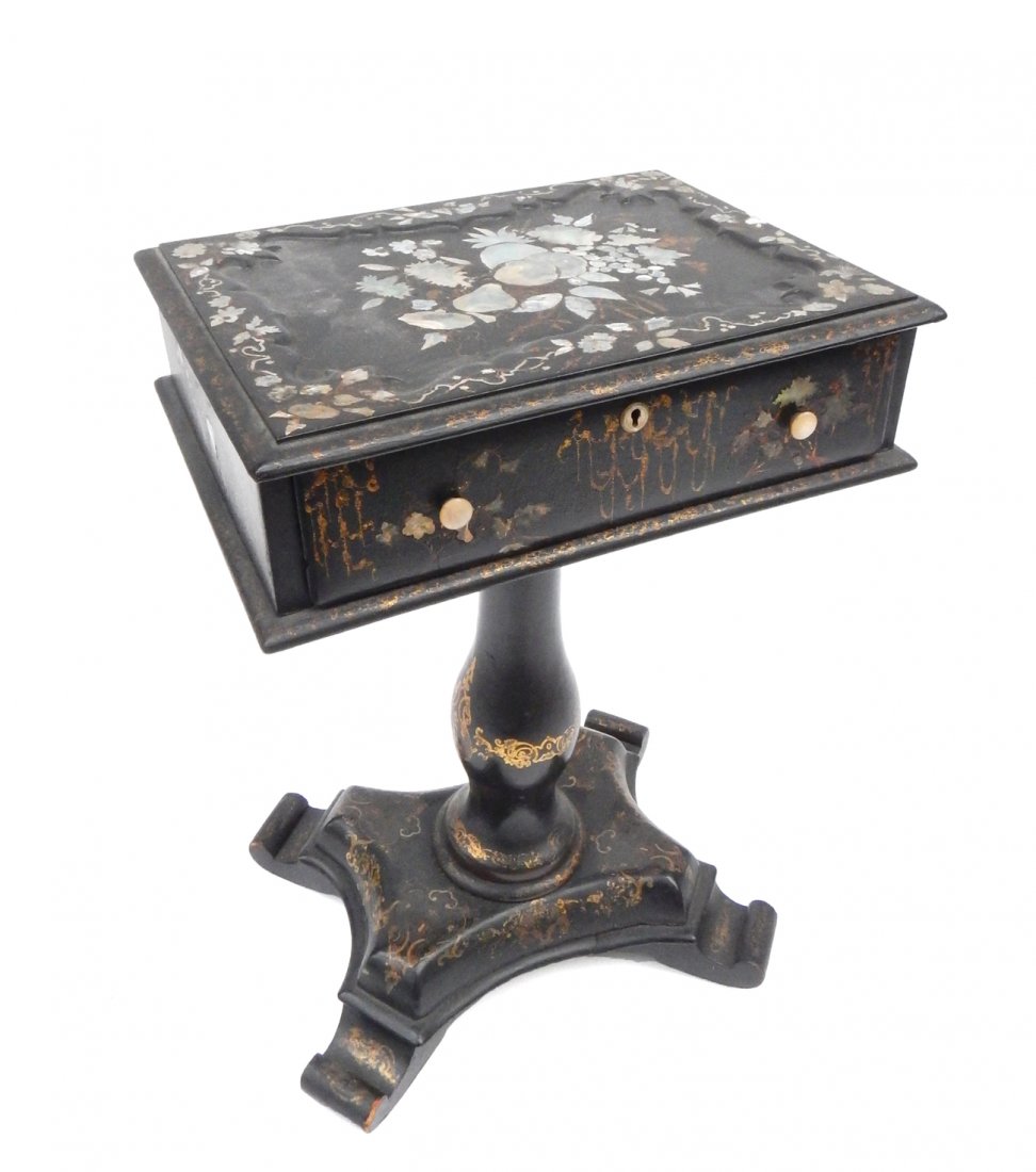 Victorian Sewing Box: Black lacquer Victorian sewing box with mother-of-pearl inlay on a pedestal base. [16 3/4" W x 13" D x 24" H]. Top piece separated, otherwise in overall good condition.