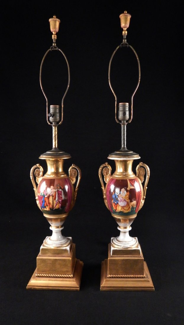 Pair of Paris Porcelain Lamps: Pair of 19th century lamps, each with a hand-painted figural and landscape scenes. [Vases only: 13" H; Overall height: 23 1/2" H]. Some paint loss, especially to bases.