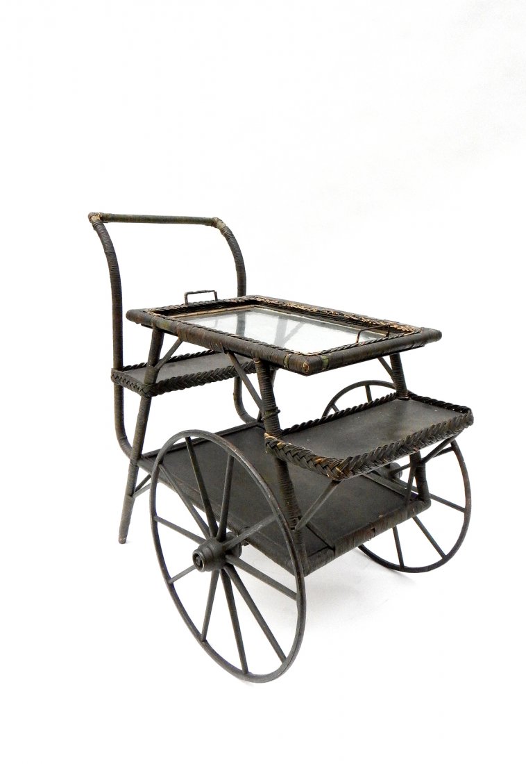 Antique Wicker Tea/Bar Cart: Green finish three-tier cart with removable top glass tray. [24" W x 31 1/4" D x 34 3/4" H]. Wear with repairs to handle.