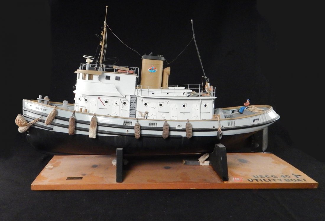 Vintage Scale, "Misty Bay" Tugboat Model: Outfitted for remote control (needs restoration). Resin and plastic model with mount. [Boat only: 36" L x 10 1/2" W x 20 1/2" H]. Accompanied by non-matching mount. Sold "as is".
