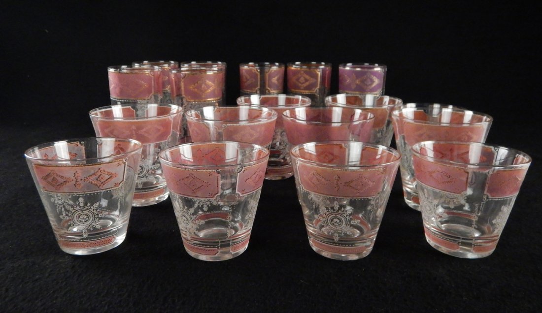 19 "Madmen" Era Cocktail Glasses: Comprising: 11 tumblers, 7 highball glasses with gilt and magenta accents. Light wear, few nicks.