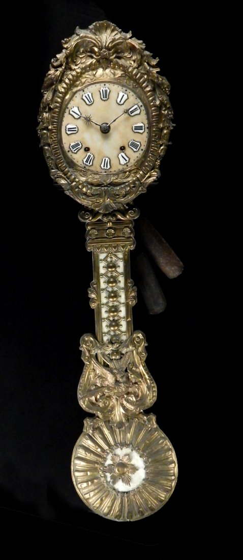 Antique Wag-on-Wall Clock: Ornate brass and tole wag-on-wall with stone dial plate, applied enamel hour markers, and steel hands with star accents. [14 1/4" W x 6" D x 56" H]. Retains pendulum bob with sunburst and iron weights