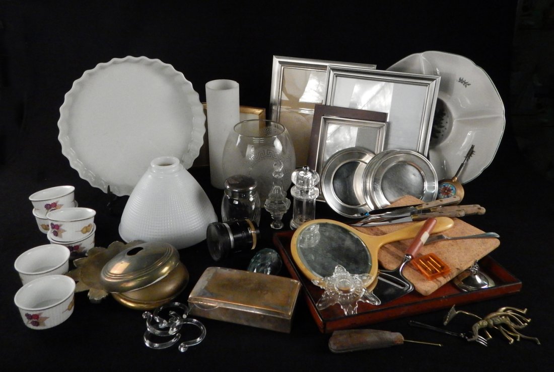 Discovery Box Lot: Comprises decorative articles including: table top picture frames, 5 Royal Worcester ramekins, 6 sterling plate bread and butter dishes, bronze furniture hardware, chandeliers canopies, and more. Cond