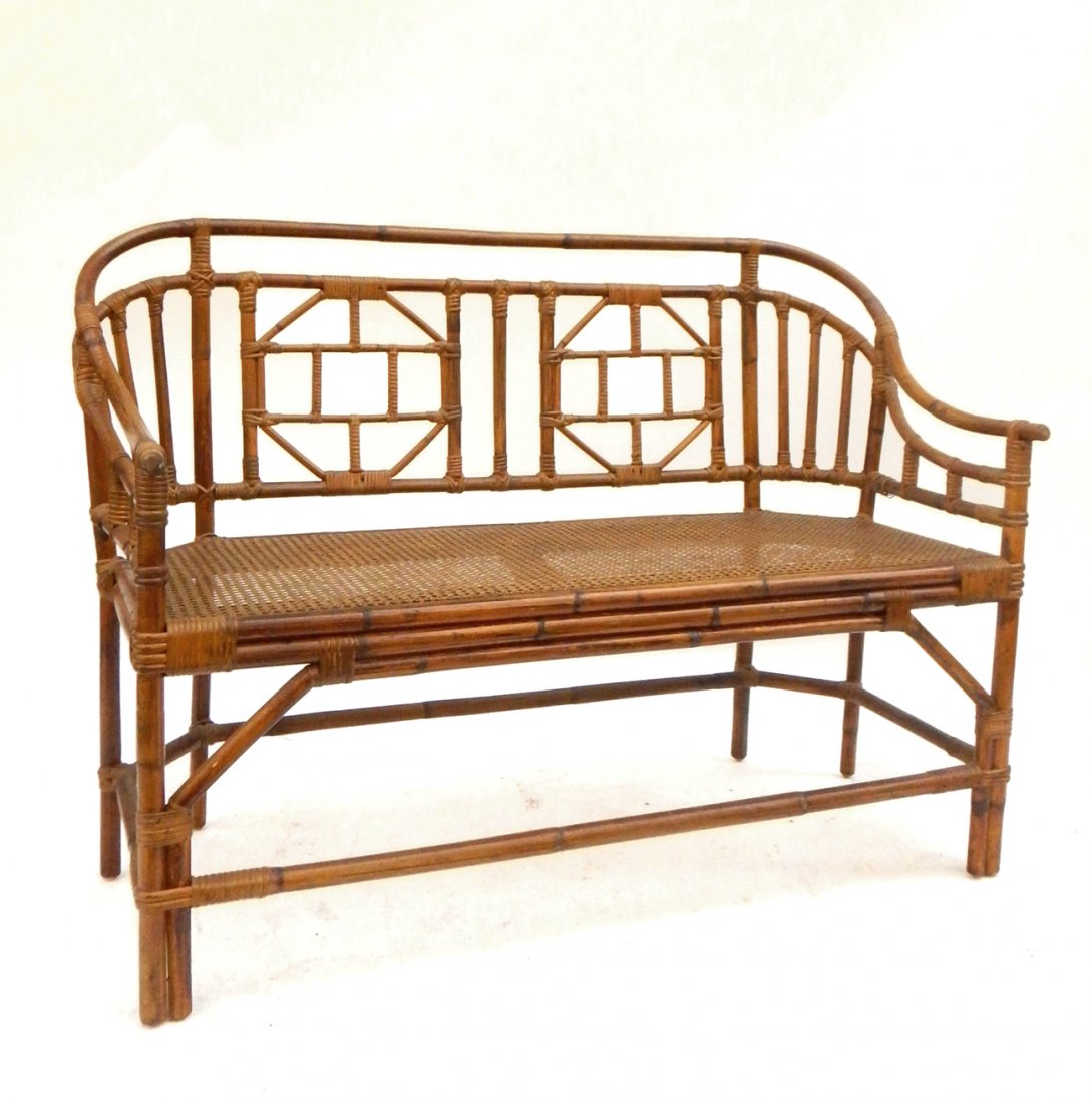 Vintage Caned Bamboo Settee: Bent bamboo settee with caned seat. [50" W x 19 1/4" D x 34 1/2" H]. Light soiling and wear.