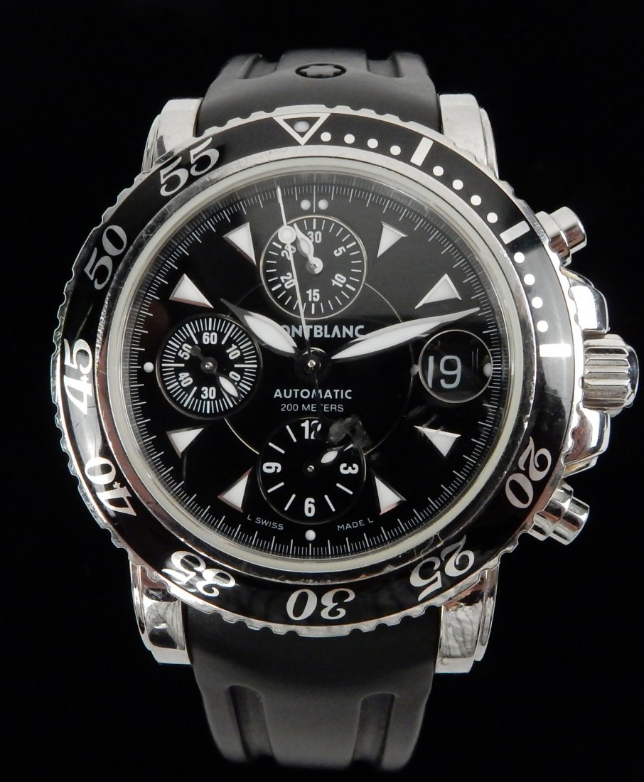 Montblanc Meisterstuck Men's Wrist Watch: Stainless steel sport watch with black rubber band. Back stamped with serial #7034-PL373727. Light wear. Movement not tested. Sold "as is".
