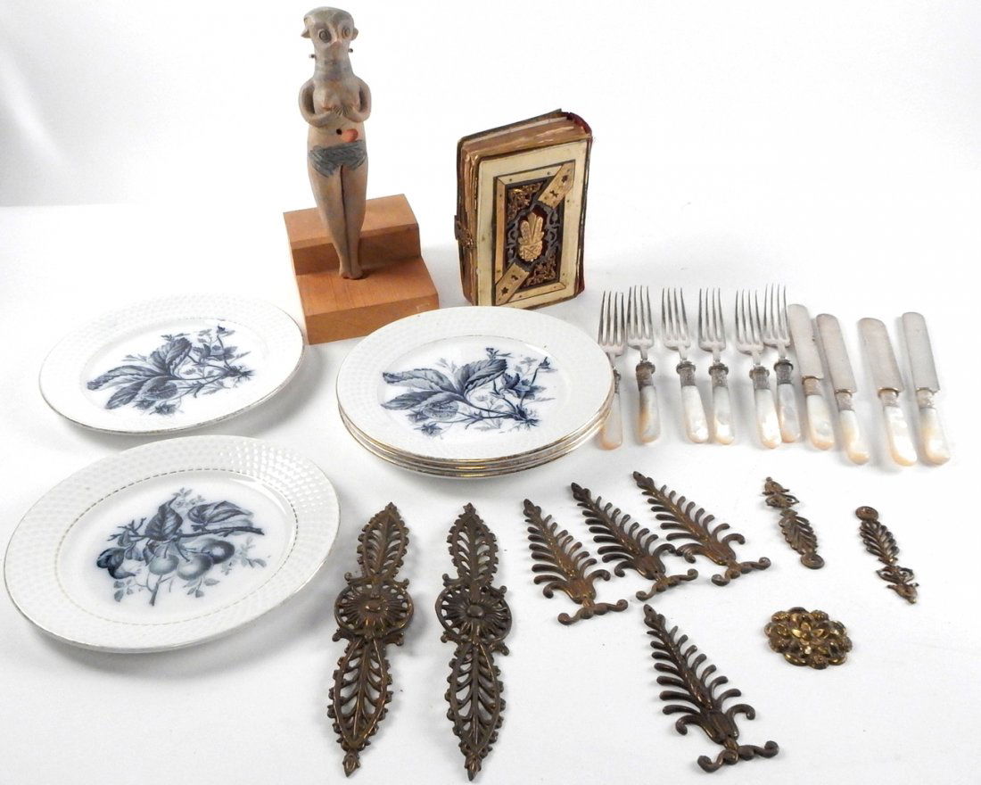 Group of 25 Items: Group of 25 items including: 5 P. Regout & Co. dessert plates; Hebrew and English Torah with carved bone cover; ceramic figure; numerous brass appliques; two brass knobs; group of knives and forks wit