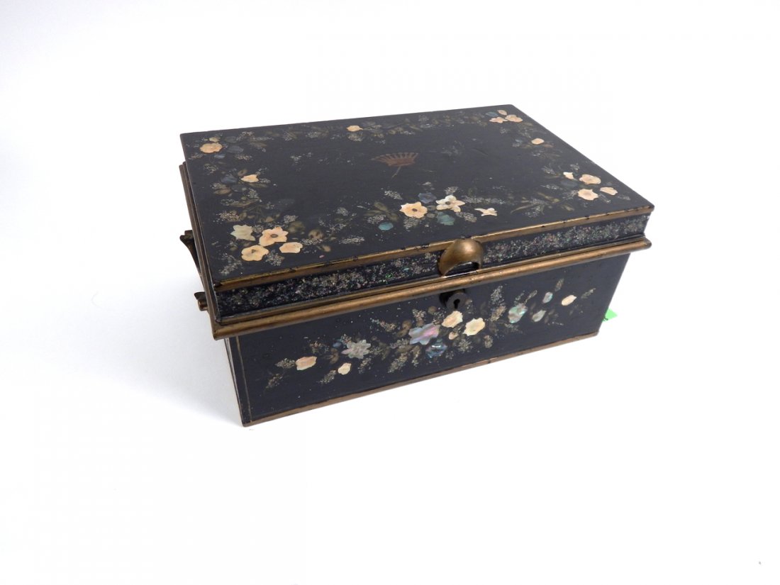 J. Hodges Lacquered Tin Box with Inlay: Featuring floral mother-of-pearl and abalone inlay with gilt accents and brass hardware. [14 3/4" W x 9 3/4" D x 6" H]. Craquelure in lacquer, wear throughout to finish. From the Estate of Edith K. Co