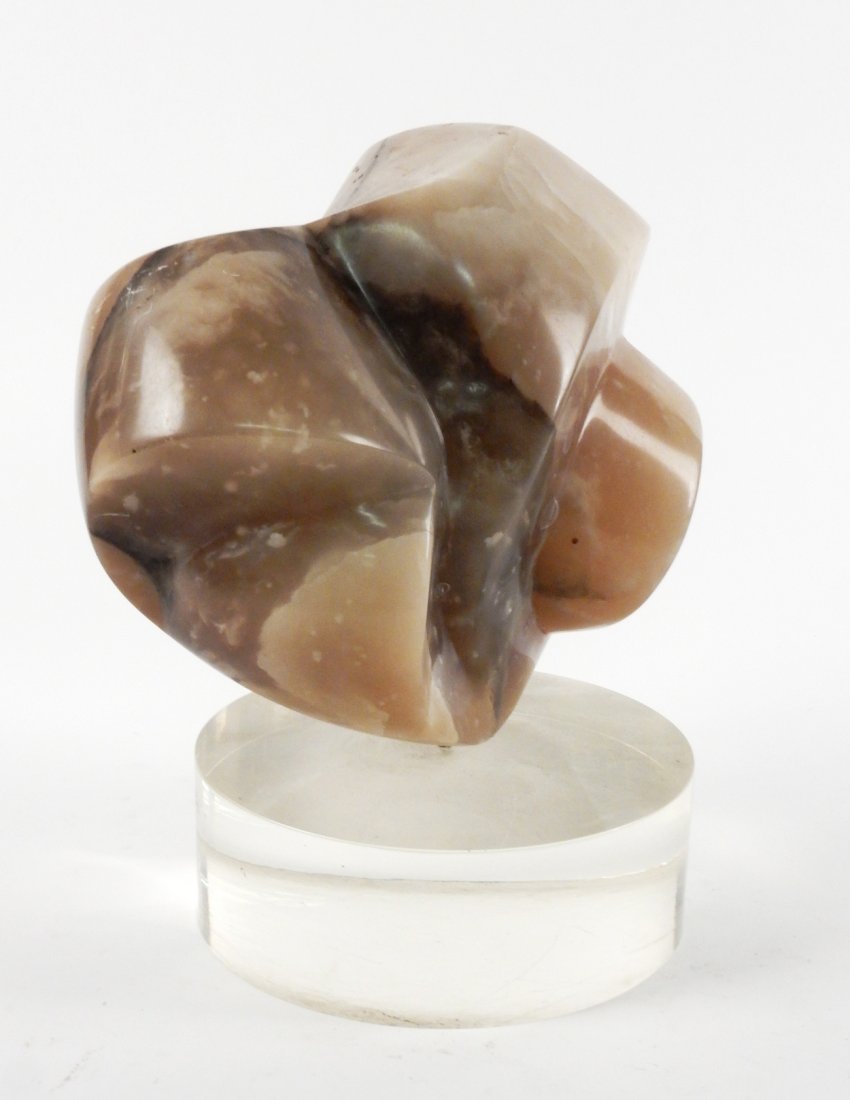 Biomorphic Carved Brown Marble Sculpture: Anchored in a round Lucite base. [9 1/2" W x 6" D x 8 1/2" H (without base); Base: 2 1/2" H]. Minor surface abrasions.