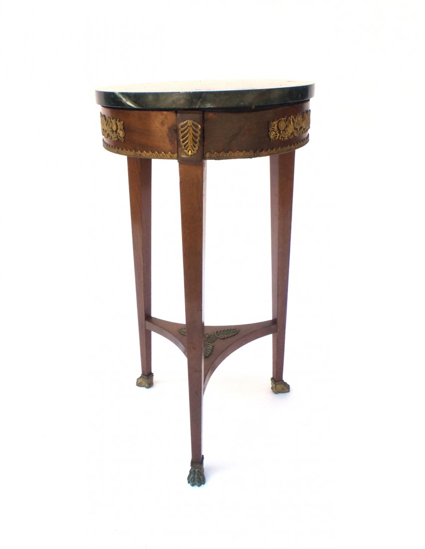 Empire Style Marble Top Bouillotte Table: Ormulu decorated bouillotte table. [11" Dia x 29" H]. Loose construction.