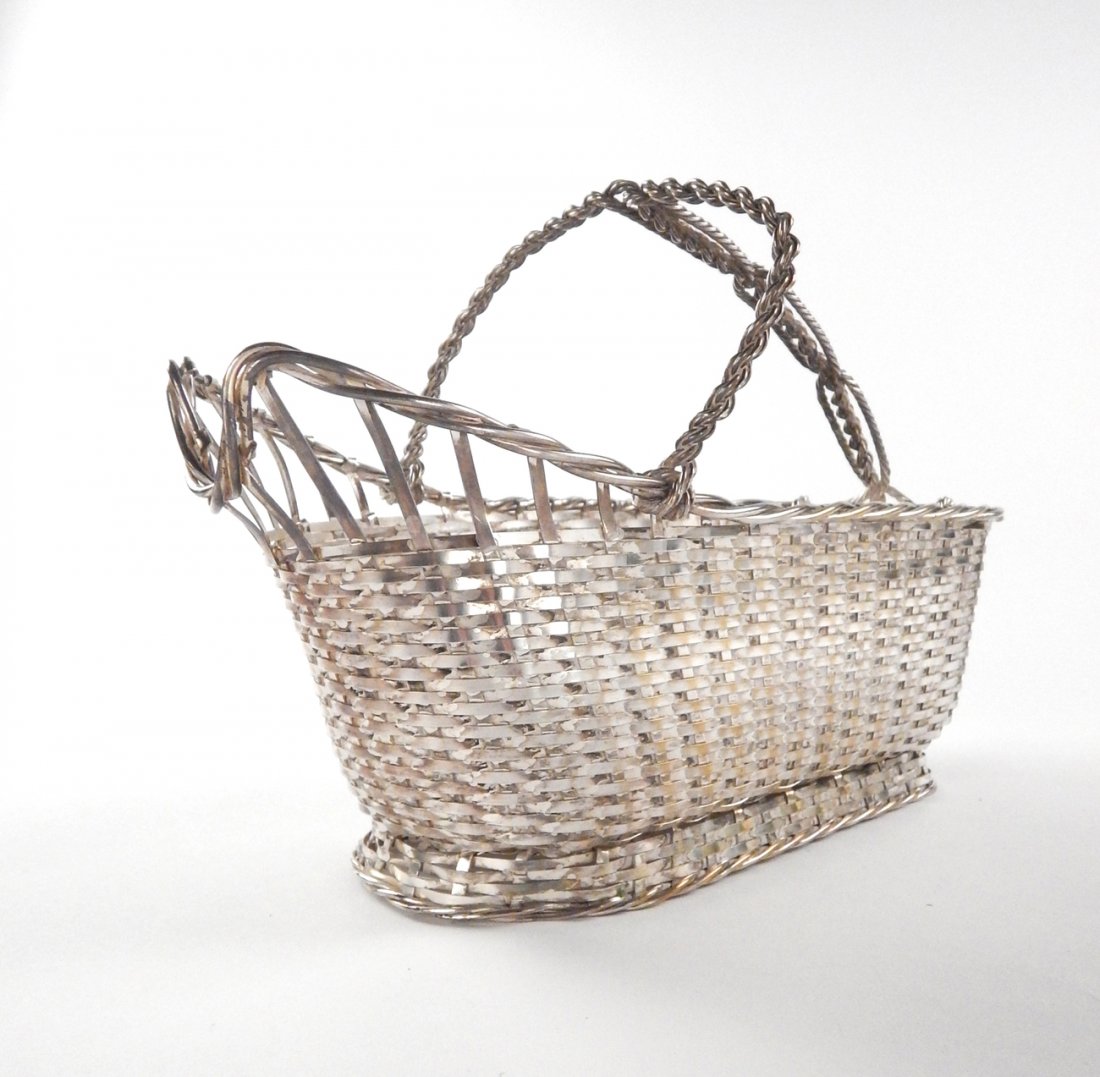 Christofle Silver Plate Wine Bucket: Christofle silver plate wine bucket. Impressed "Gallia France, Christofle". [9 1/2" x 4 1/2" x 6 3/4" H]. In good condition.