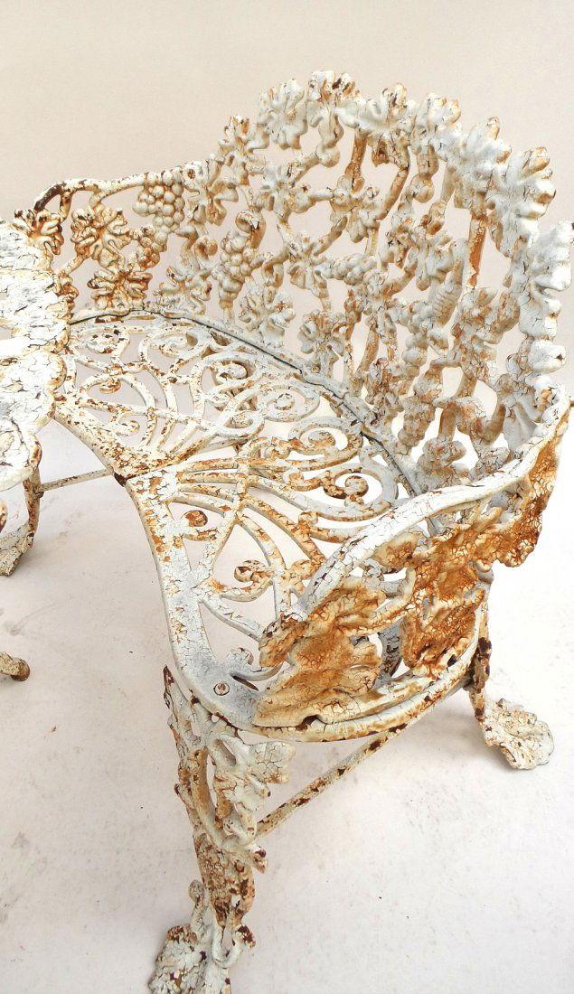 Two Victorian Garden Settees: Comprises two white painted outdoor garden settees.