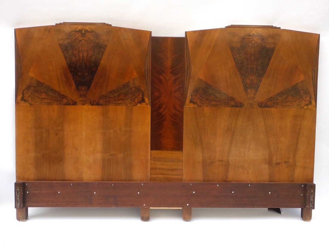 Art Deco King Size Bed Frame: Art deco king size bed frame in burlwood. Comprised of two single frames converted to king size frame with rails. [79" W x 80 1/2" L; Headboard: 53 3/4" H x 79" W; Footboard: 35" H x 79" W]. In good c