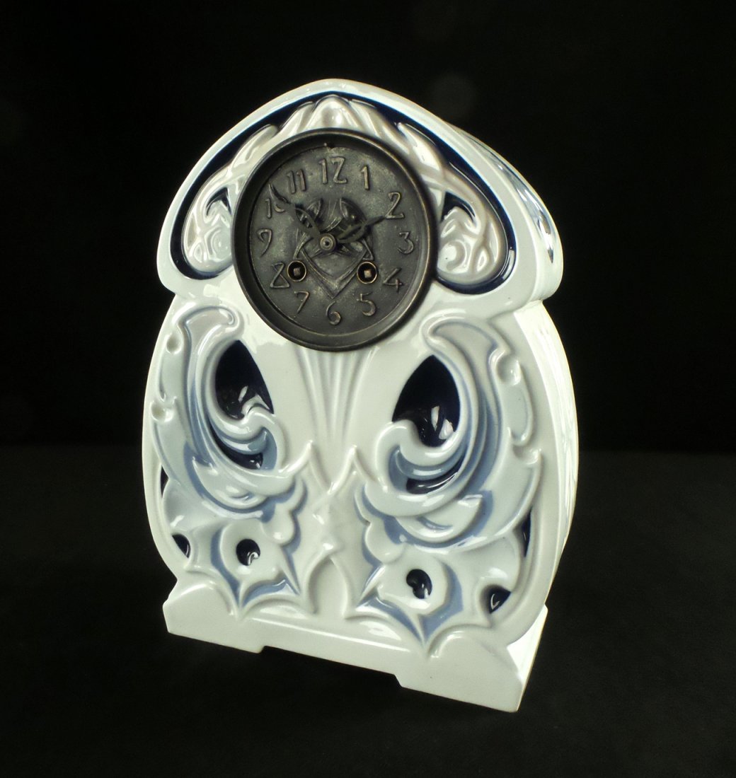 Bind and Grundahl Danish Clock: Blue and white decorated mantle clock. [12" H x 9" W x 3" D]. Works not tested.