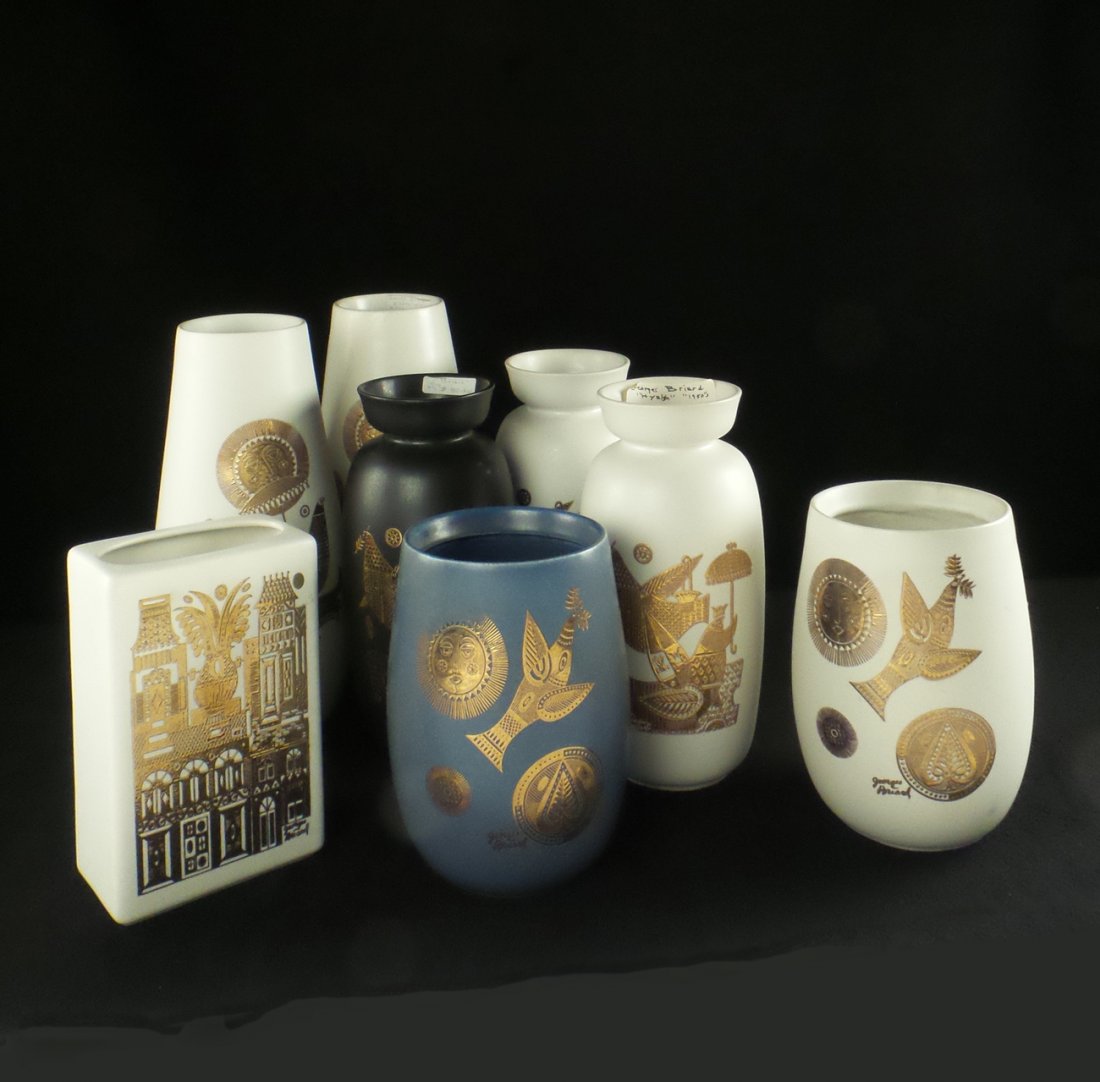 Eight "Georges Briard" Design Vases: Comprising 6 white and gold decorated vases, 1 blue vase, and one black and gold vase. Made for Hyalyn, USA, c. 1950. [8" to 12" H x 3 1/2" to 5" Dia]. In overall good condition.