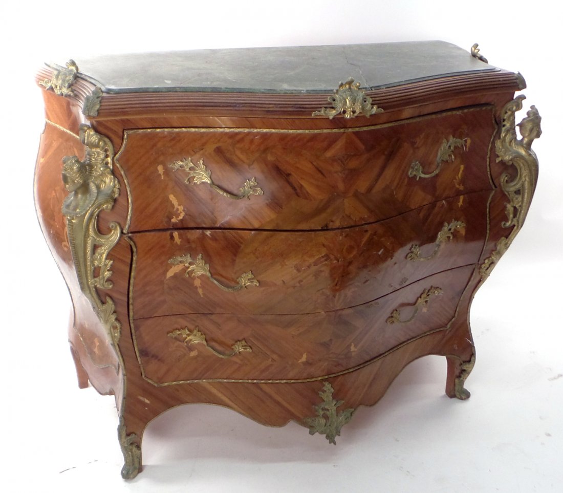French-Style Marble Top Commode: 20th century Egyptian-made bombe commode with bronze mounts. [43 1/2" L x 23" D x 39" H]. Marble "as is", losses to veneer.