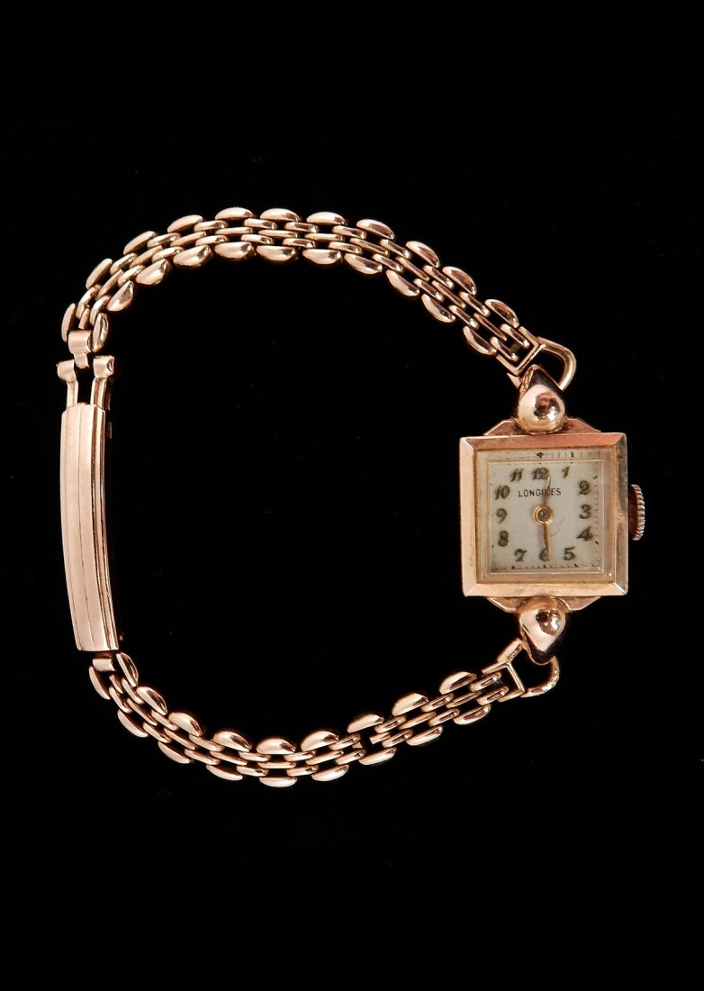14k Pink Gold Art Deco Ladies Watch: Art Deco 14k pink gold ladies watch featuring square face. Longines makers. In good condition. 9.2 dwt with works.