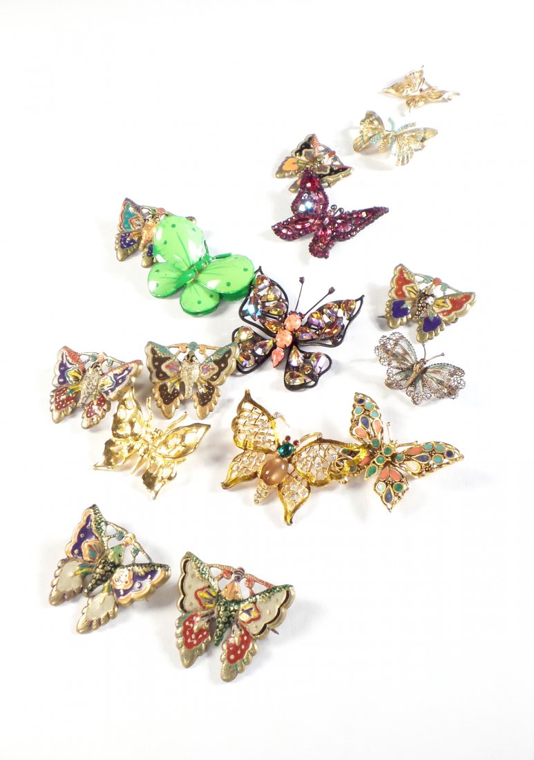Collection of Butterfly Pins: Collection of butterfly pins including Hattie, Carnegie, Trifari, Weiss, others. 15 items. Various materials and sizes. [1 1/4" to 2 1/2"]. Some imperfections.