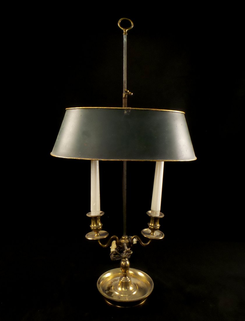 Louis XVI-Style Brass Bouillotte Lamp: Features adjustable oval green tole shade over two lights. [25 1/2" H x 13 1/2" L]. Tarnished, losses to paint, other minor flaws.