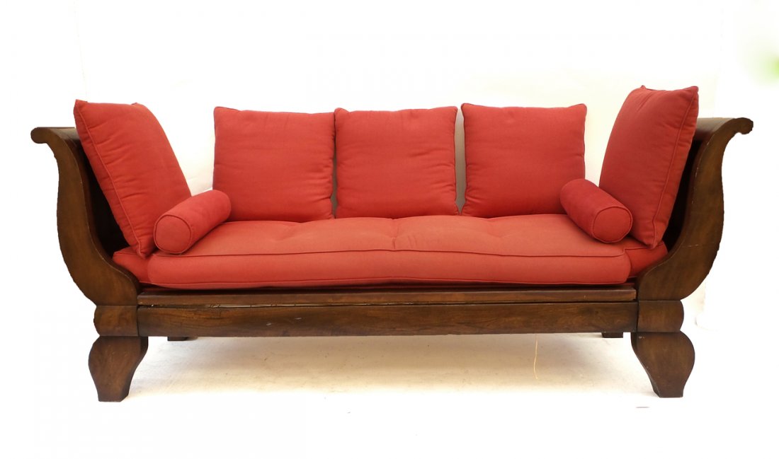 English-Style Daybed: Walnut daybed with a rose slip cushion and bolsters. [84 1/2" L x 25 1/4" D x 36" H]. Overall good condition.