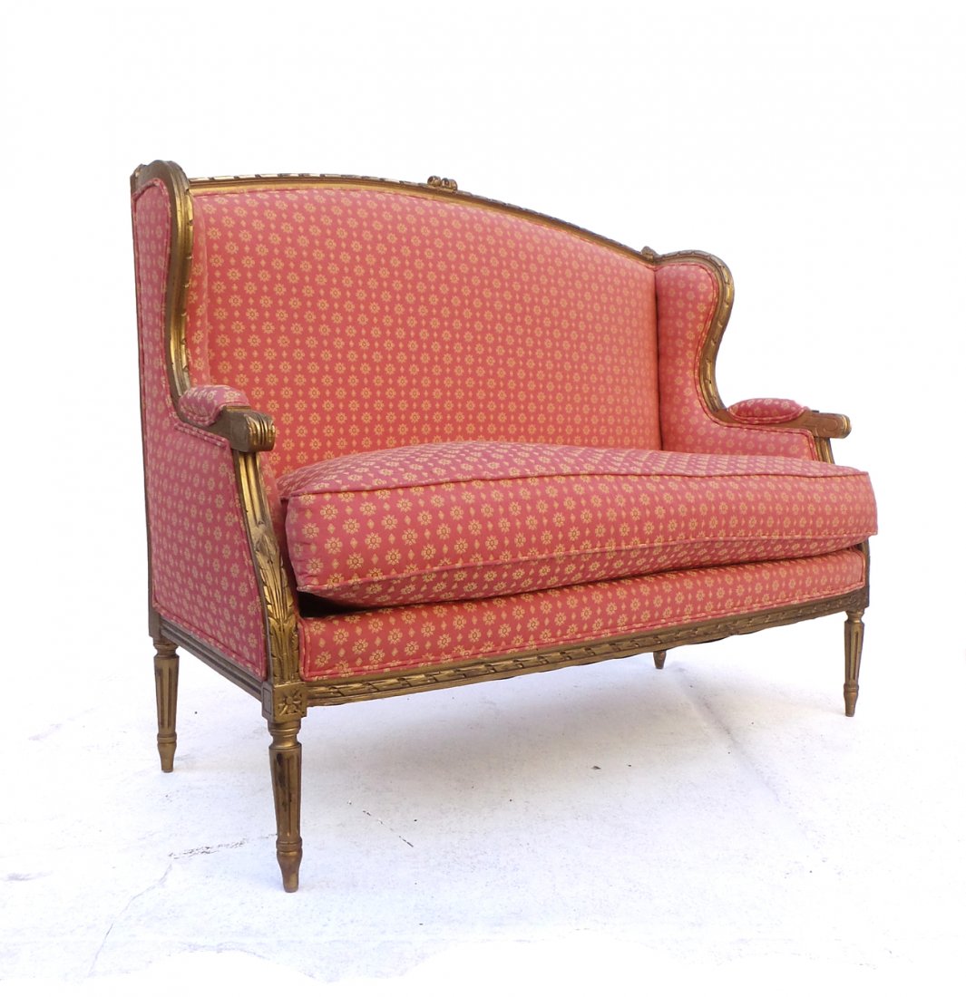 Louis XVI-Style Giltwood Settee: 20th century Louis XVI-style carved giltwood settee. [52" W].