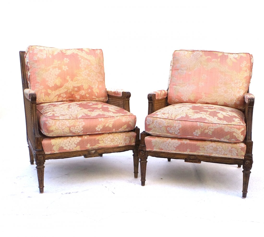 Pair of French Style Caned Bergeres: Pair of 20th century Louis XVI style caned side bergeres. [36" H x 29" W].
