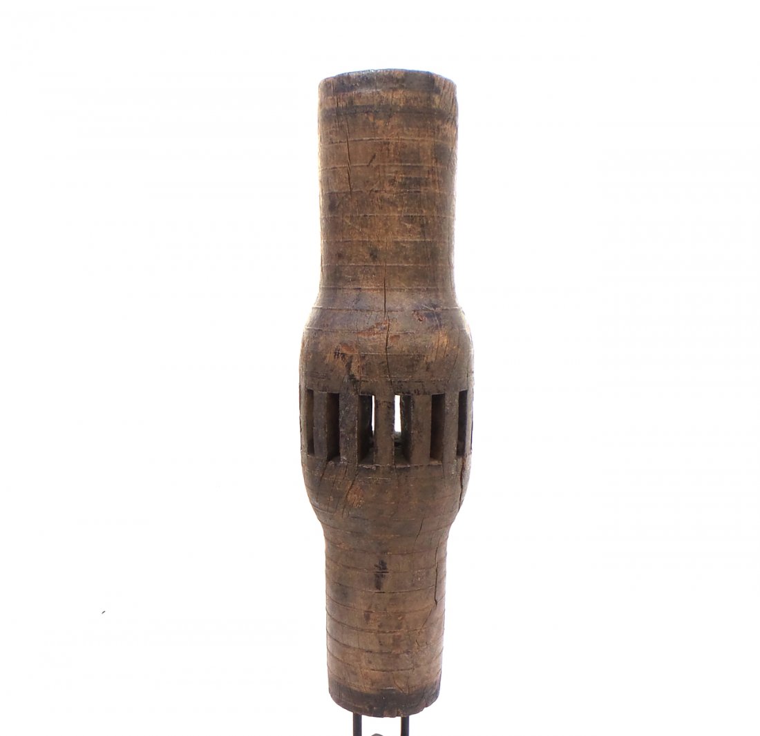 Indonesian Carved Wood Axel: Carved wood Indonesian axel mounted on base. [30" H x 7" x 7"]. In good condition.