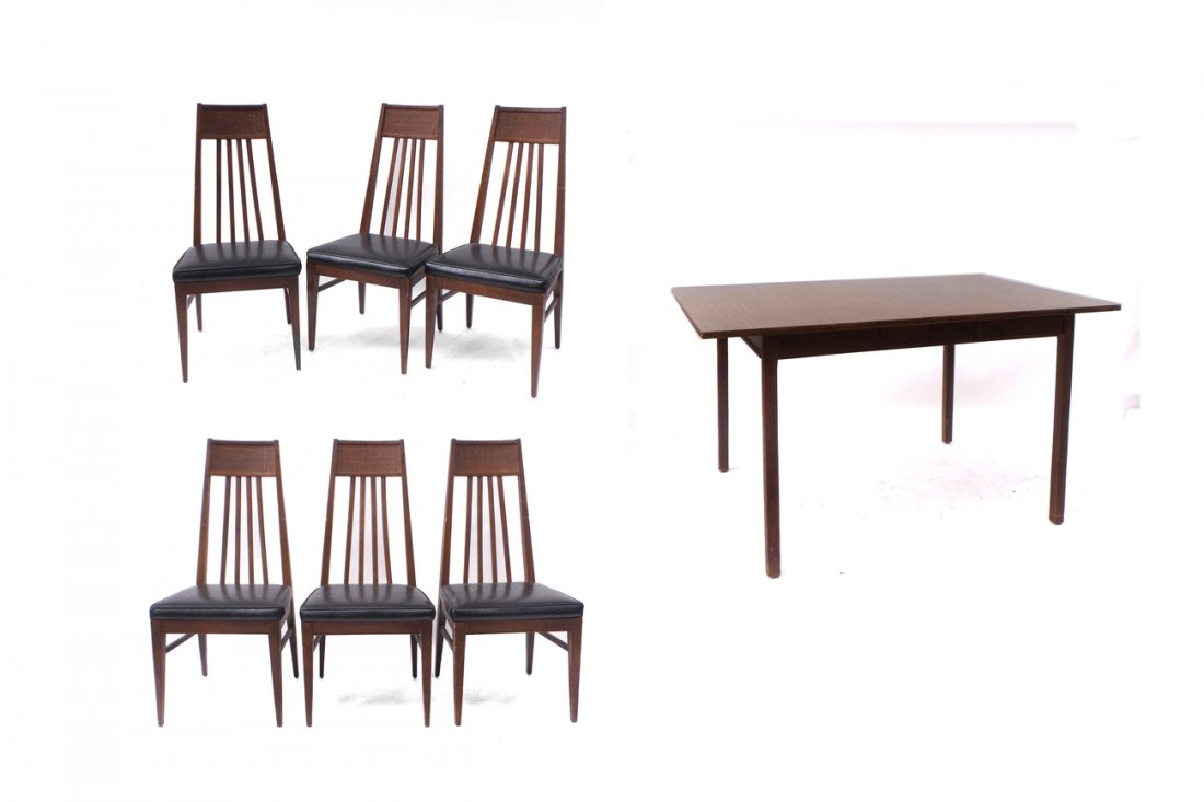 Dining Table with Six Chairs: Dining table with two leaves, and six chairs with black naugahyde upholstered seats. [Table: 56 1/2" L x 38 1/4" W x 29 1/2" H; Leaves: 12" W each; Chairs: 19" W x 18" D x 42" H]. In good condition.