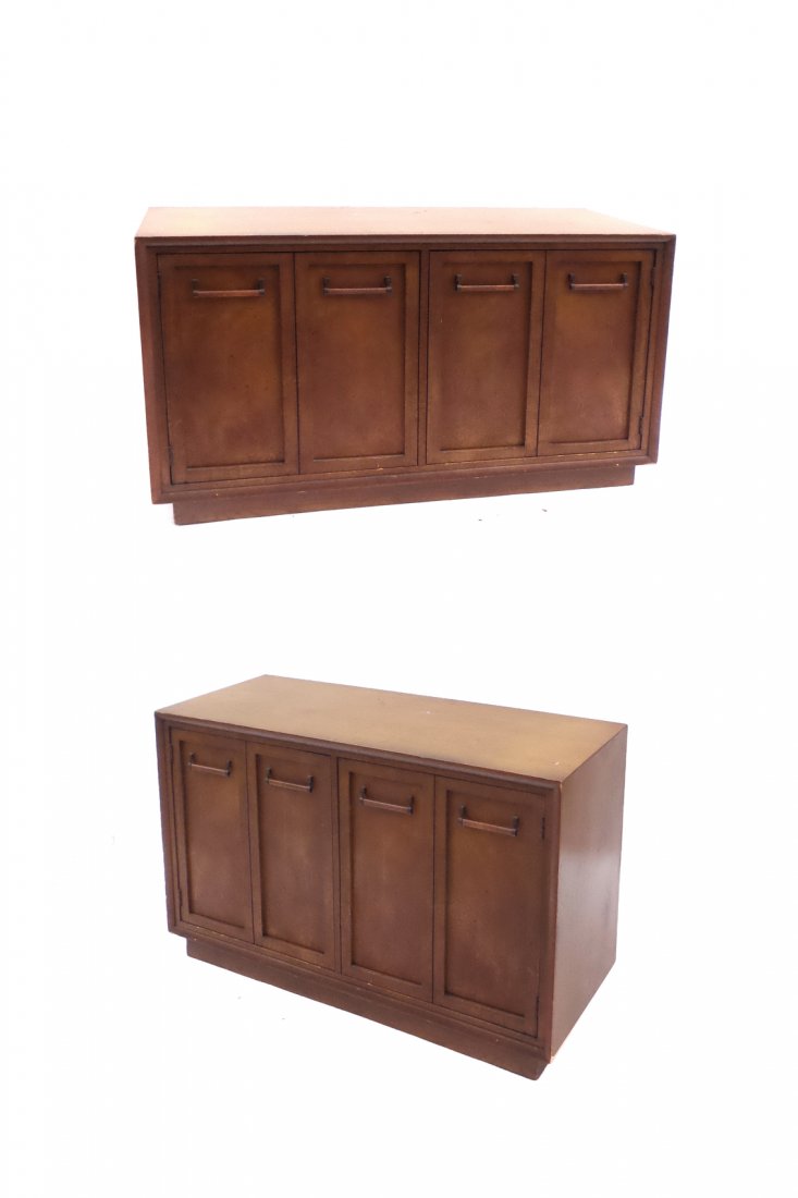Pair of Credenzas: Pair of walnut credenzas each featuring two doors. [48" W x 18" D x 30" H]. In good condition.