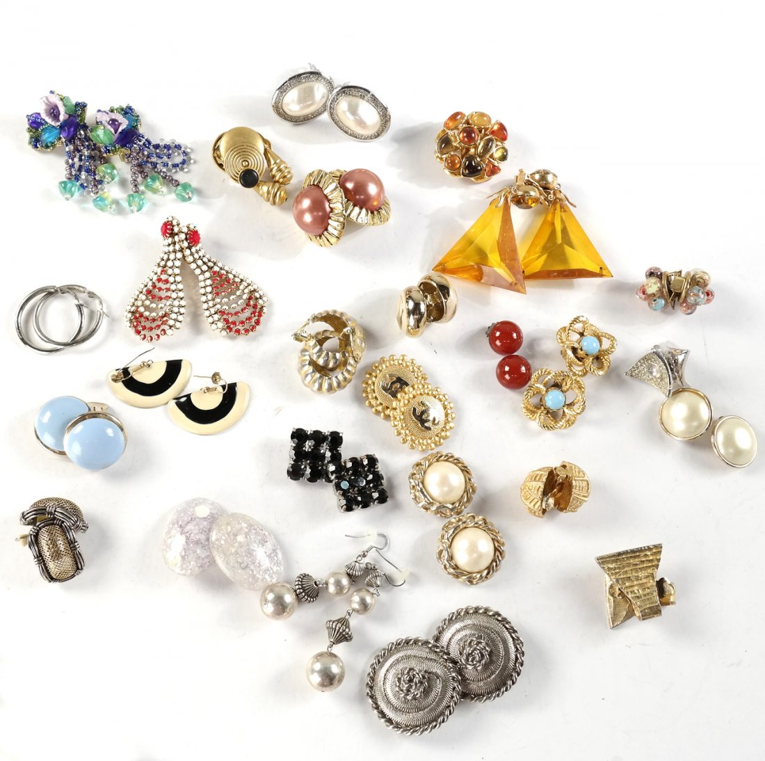 Givenchy and Other Earrings: Mixed lot of 24 pairs of earrings including makers: Givenchy, Poggi, Cadoro, and Les Bernard. Repairs, losses, and imperfections.