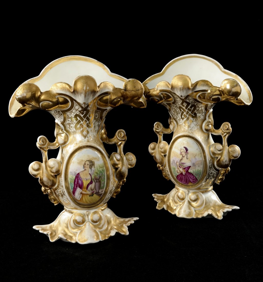 Pair of Old Paris Vases: Pair of old Paris vases with hand-painted figures of a woman with gilt trim. [10 3/4" W x 5" D x 13 1/2" H]. One good condition, the other repaired.