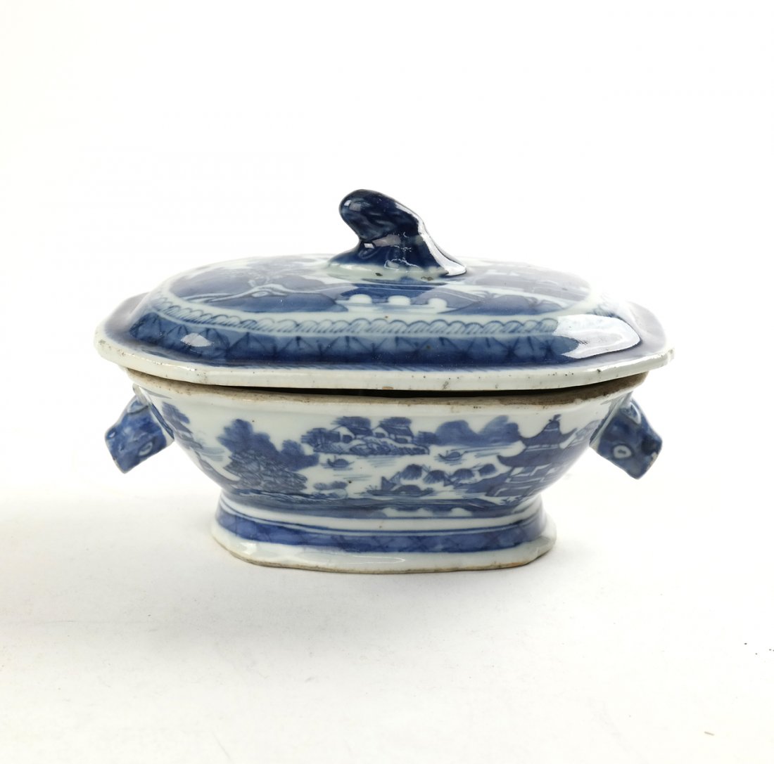 Asian Decorated Casserole: Blue and white decorated covered casserole boat. [7 1/2" x 5" x 4" H]. Wear, imperfections in glaze.