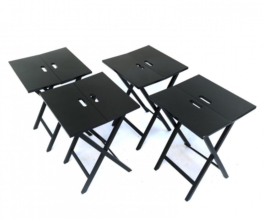 Set of Four Black Snack Tables: Set of four folding tables.