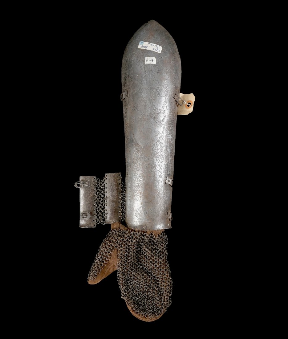 Persian Armor Arm Guard: Persian armor, left side proper, arm guard and chainmail with leather glove. [20 1/2" L]. Worn with signs of rust.