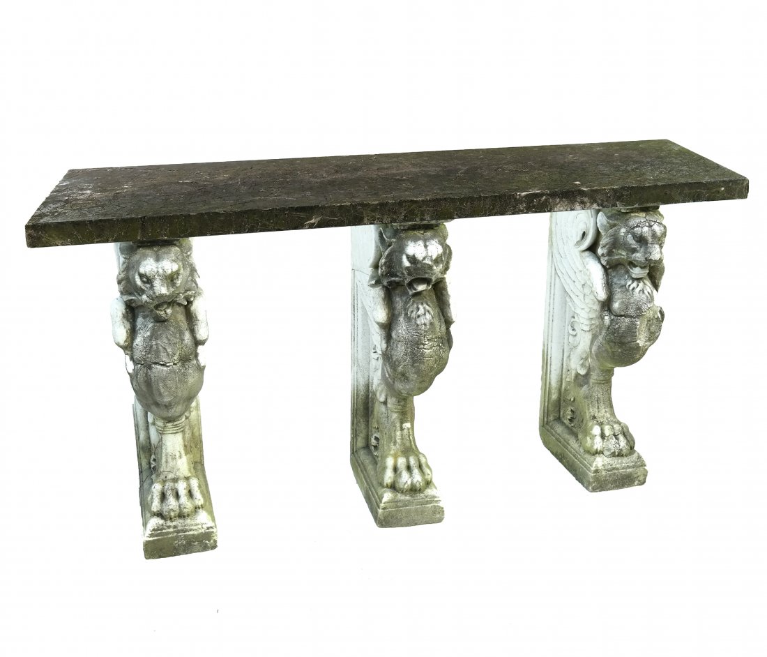 Marble Griffin Console: Marble griffin console with green marble top and three pedestal griffins. [72" L x 20" W x 38 1/2" H]. One griffin broken, chipped, weathered and worn.