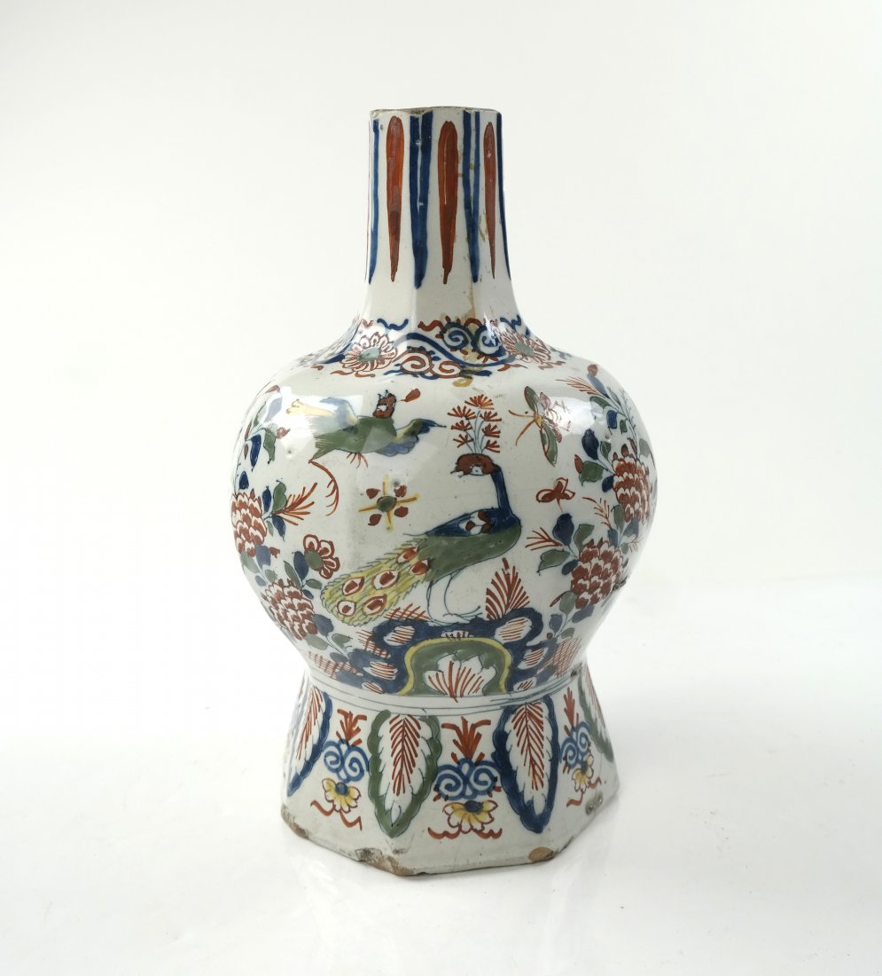 Asian Motif, Hand-Painted Bulbous Vase: Asian motif hand-painted bulbous vase, tin glaze. Peacocks and flowers. [5 1/2" Dia x 9" H]. Old crack repair with staples, chips along base.