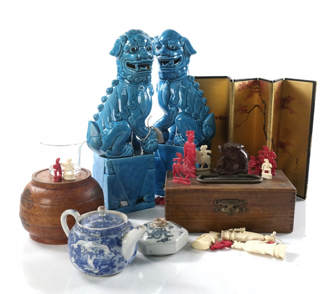 Assorted Asian Decorative Objects: Comprises a pair of turquoise glazed foo lions, chess set, small teapot, soapstone figure, small vessel, turned wood box, three stands, and a small table screen. 11 pieces total. [Tallest: 11 1/2" H].