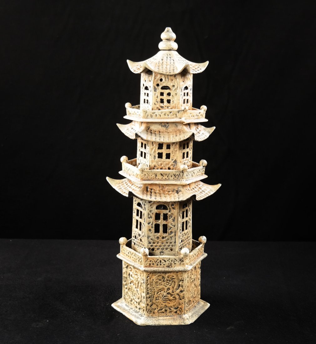 Cast Iron Model of Tower with Pagoda: Painted iron model of an Asian tower with reticulated windows and pagoda roof. 20th century. [16" H]. Good condition.