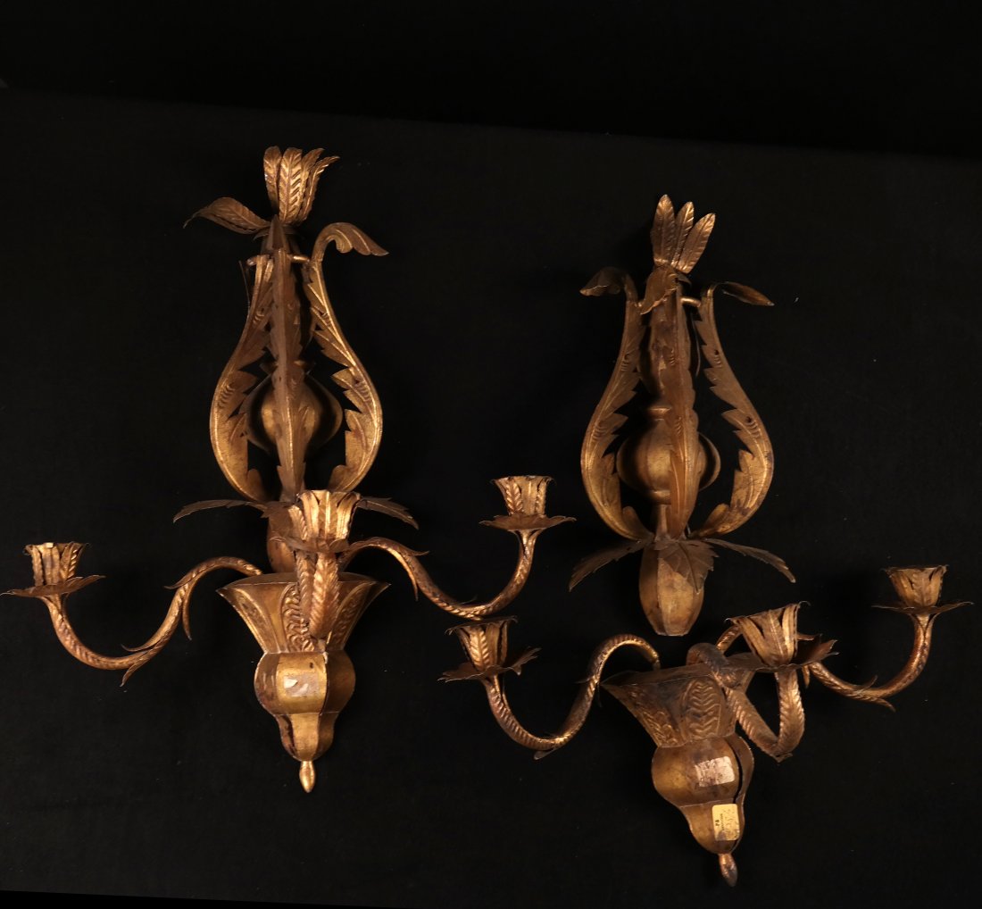 Pair of Gilt Metal Sconces: Each with three arms and foliate finial. [23" H]. Requires restoration, bent leaves. One sconce base detached, but present. Losses