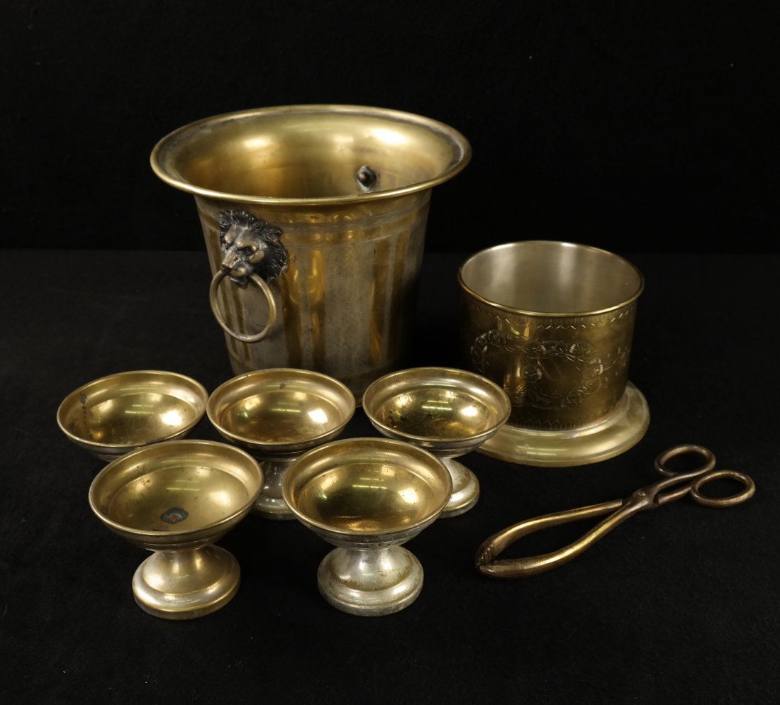 Nine Silver Plate and Brass Items: Nine silver plate and brass items including: 1.) Five silver plate/brass footed bowls. [4" Dia x 3" H]. 2.) Silver tray. [13" Dia]. 3.) Brass planter. [7 3/4" H x 10" Dia]. 4.) Brass wine coaster. 5.)